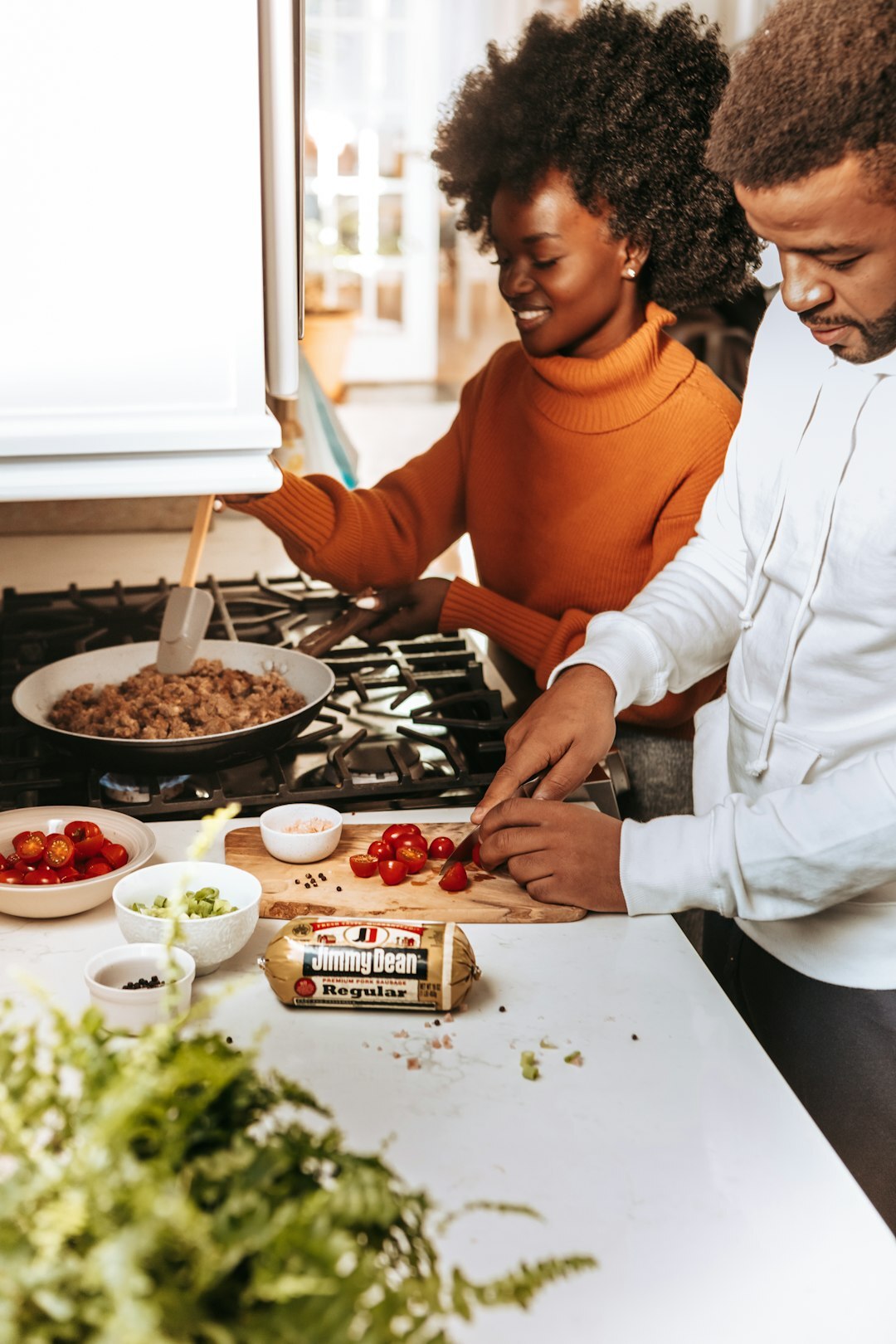 busy family cooking dinner