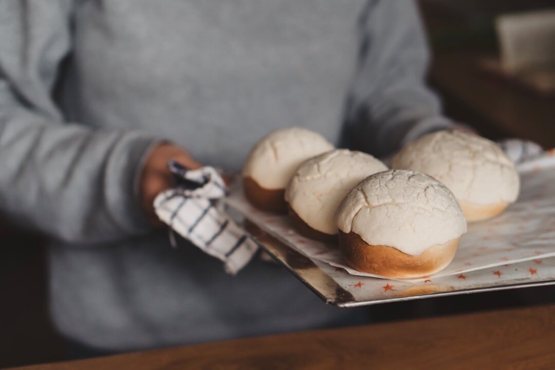 Fresh homemade Czech buchty on a baking tray