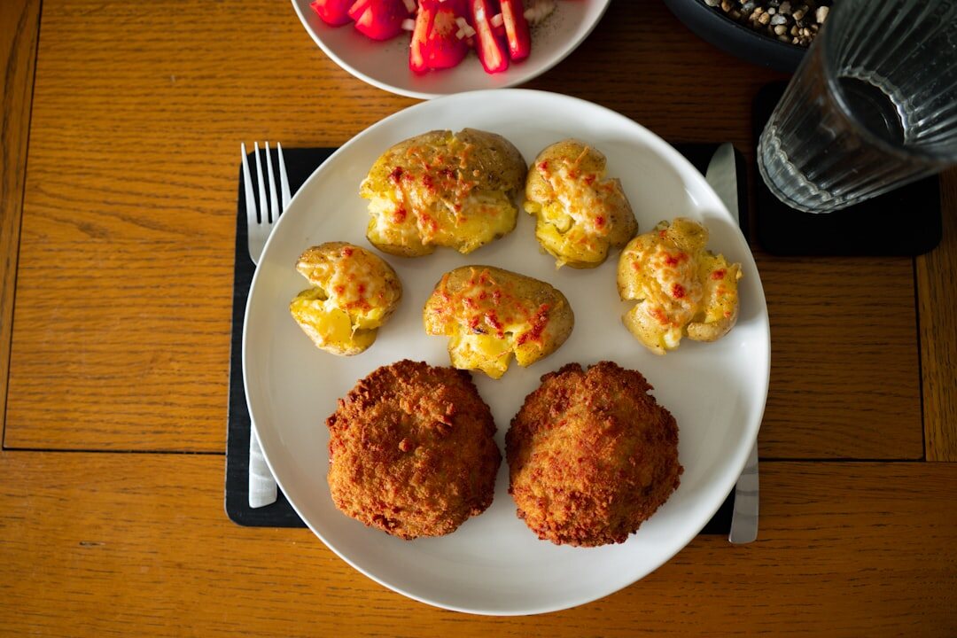 Selection of Czech potato dishes on wooden table